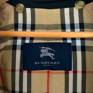 Authentic Burberry raincoat. In good condition.